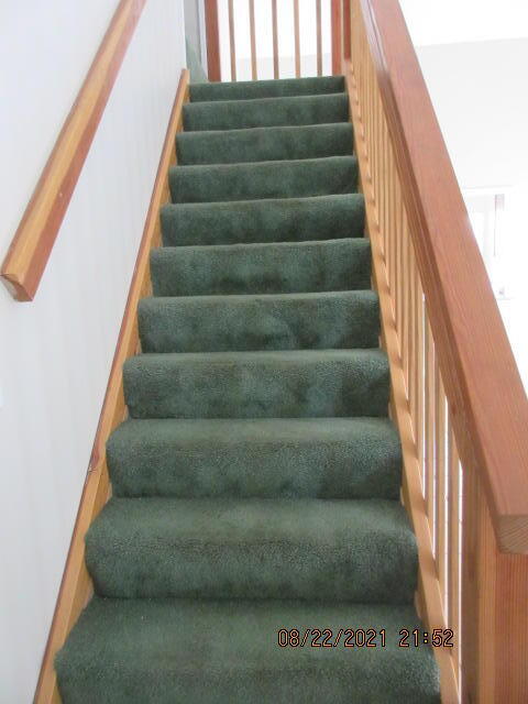 404 Adam Street Northwest Fort Walton Beach, FL 32548 - Photo 19 of 25 a view of staircase with empty racks