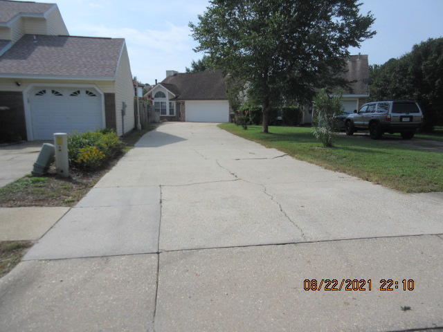 404 Adam Street Northwest Fort Walton Beach, FL 32548 - Photo 2 of 25 a view of a house with a yard