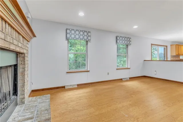 an empty room with windows