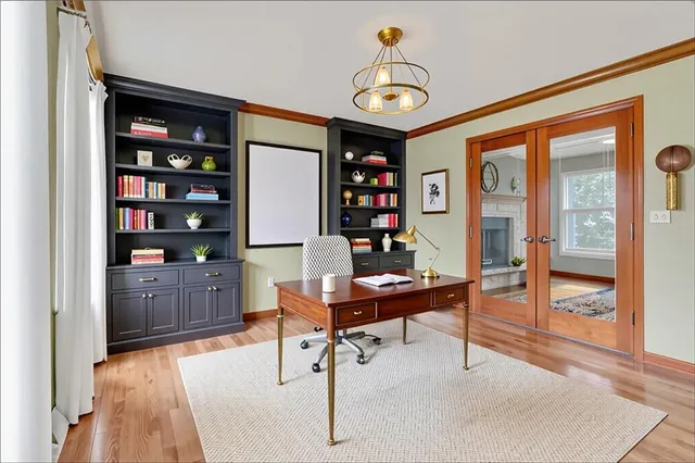 a view of a workspace with furniture