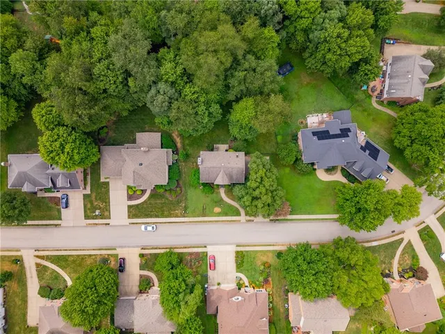 an aerial view of a house with a garden