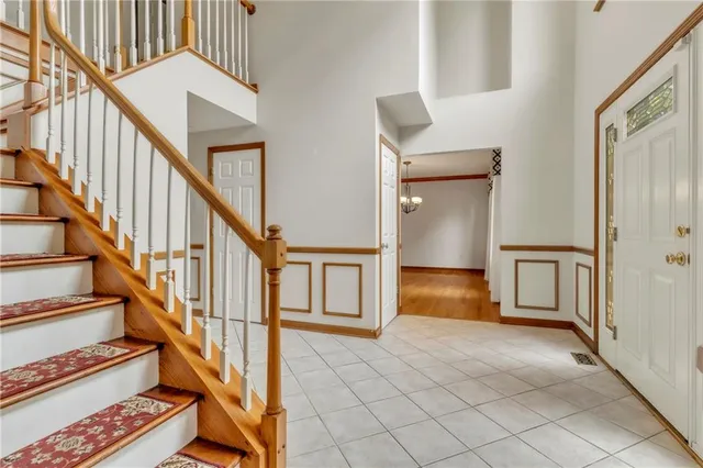 a view of an entryway with wooden floor
