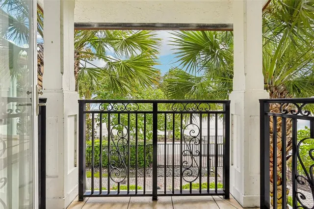 a spacious bathroom with a double vanity sink a large mirror and a bathtub