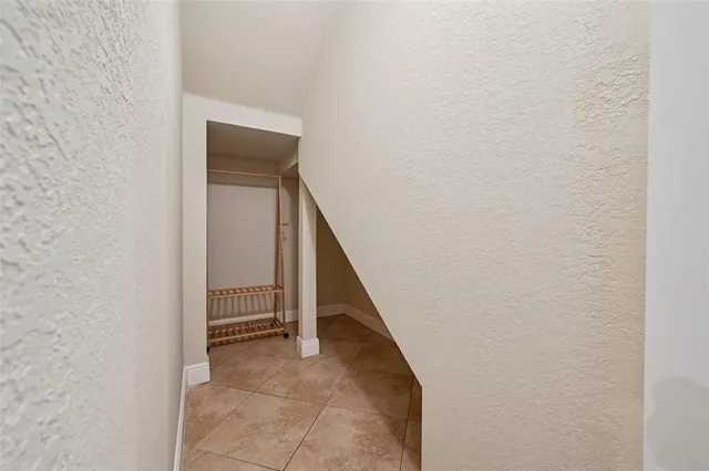 a bedroom with a bed and a cabinets