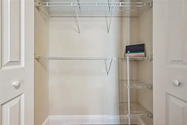 a view of a house with a fence