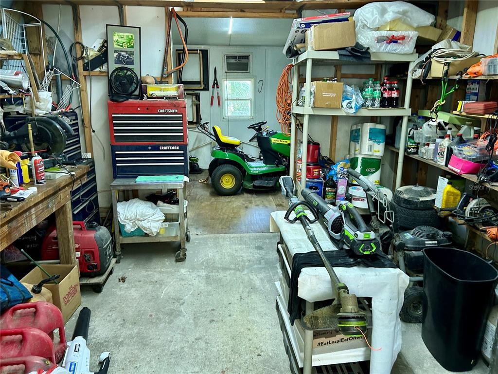 25646 Bass Road Astor, FL 32102 - Photo 35 of 48 a children and toys in the living room