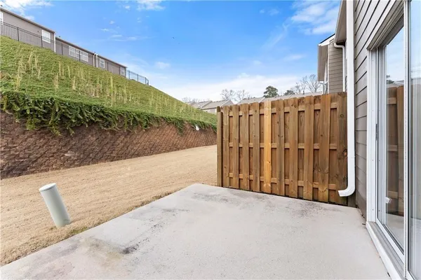 a view of terrace with wooden fence