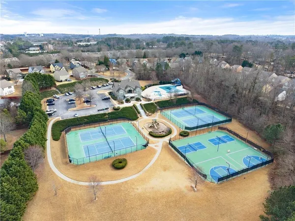 an aerial view of a swimming pool patio swimming pool and outdoor seating