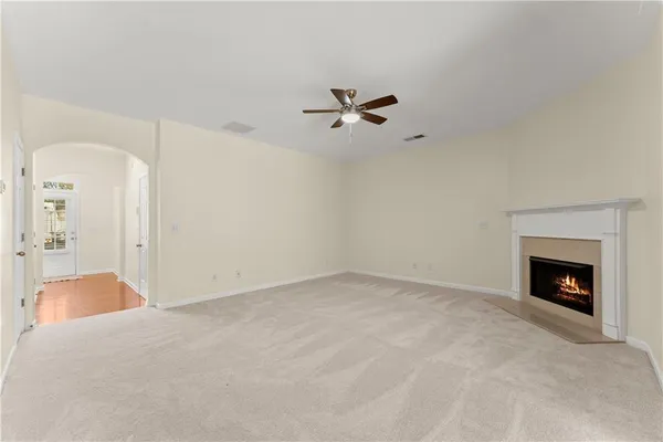 a view of empty room with fan