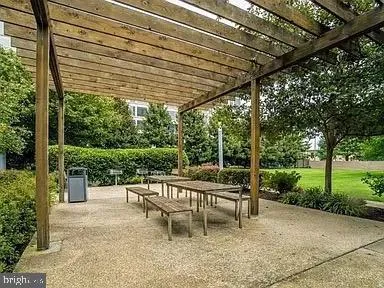 a view of a brick house with a large windows