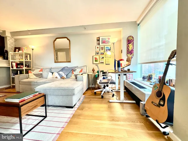 a living room with couch and a table