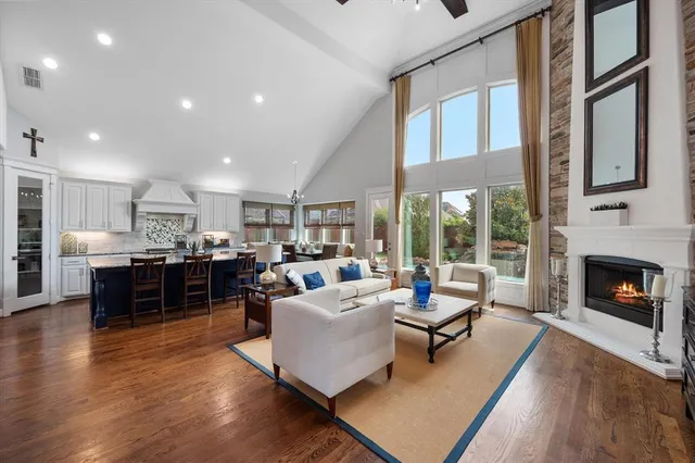 a living room with furniture or fireplace and a wooden floor