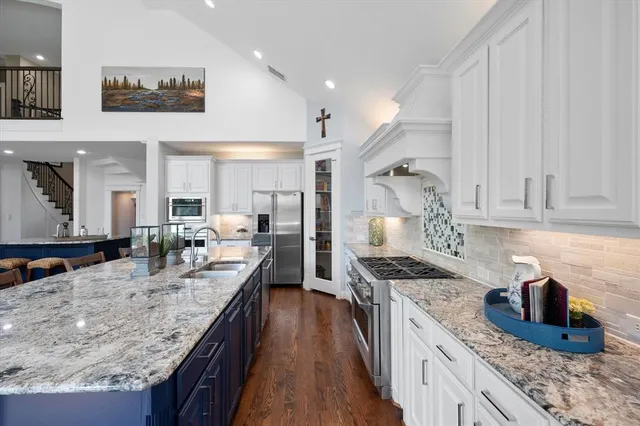 a kitchen with granite countertop lots of counter top space