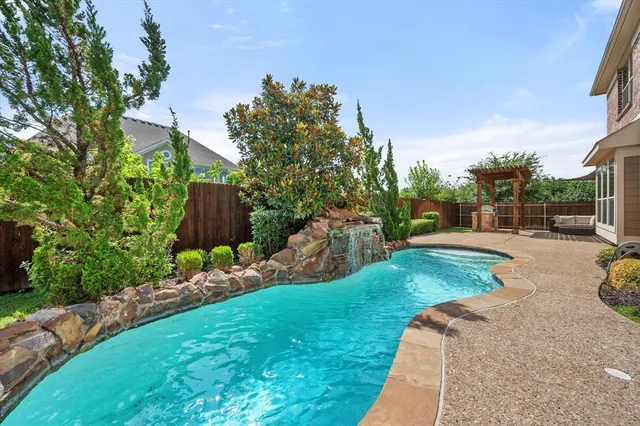 a view of a backyard with a garden