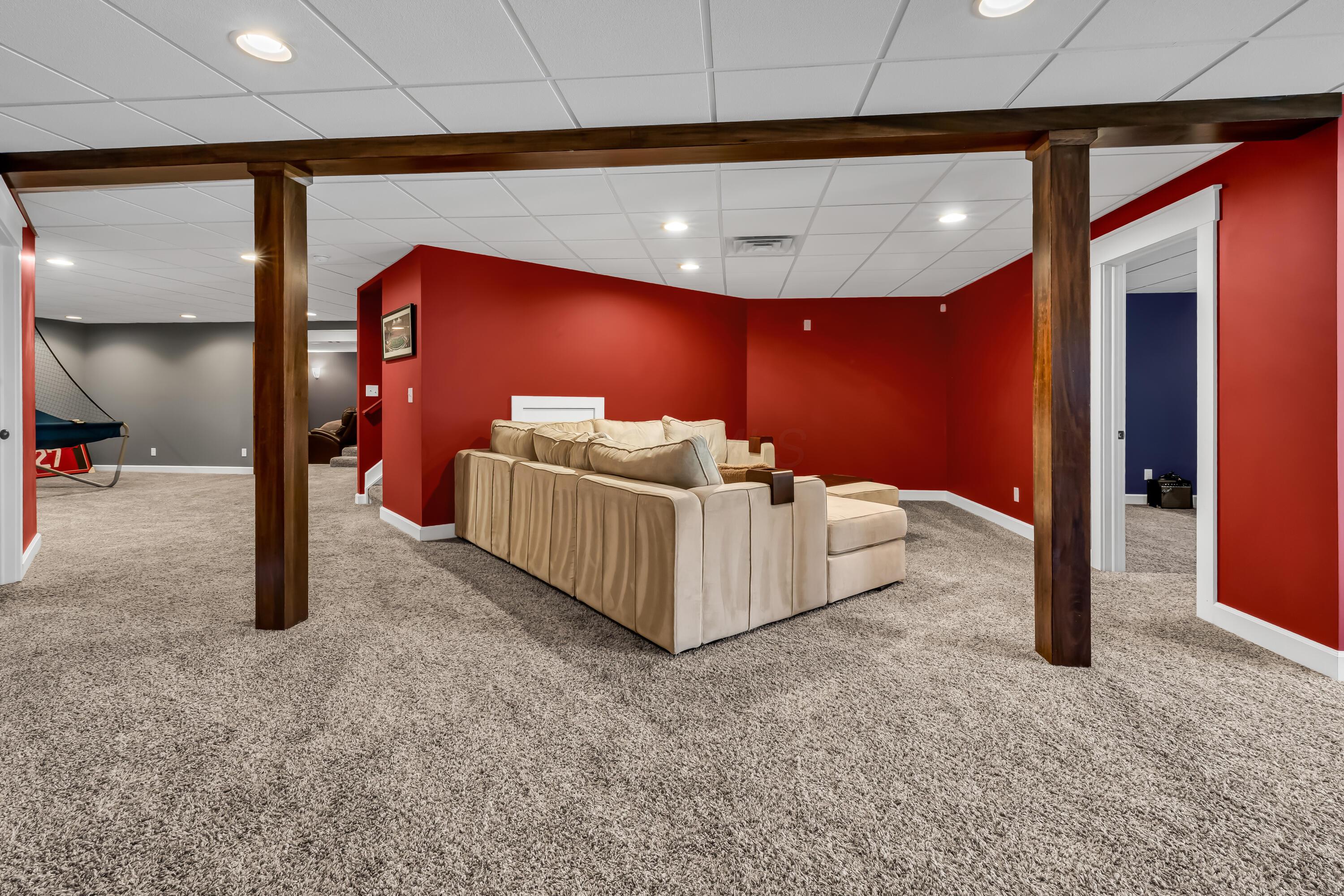16689 Bailor Road Laurelville, OH 43135 - Photo 44 of 73 • Light sand carpet
• Burgundy painted walls
• Angled wall
• Can lighting
• Acoustic ceiling tiles
• Staircase access