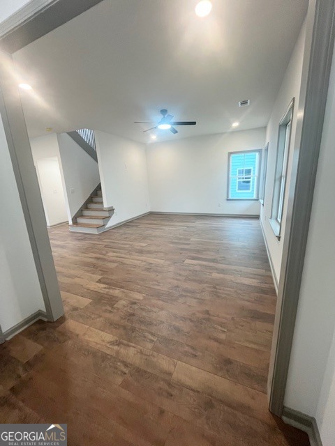 315 Ash Street Monroe, GA 30655 - Photo 14 of 21 an empty room with wooden floor and windows