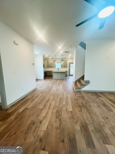 315 Ash Street Monroe, GA 30655 - Photo 15 of 21 a view of a kitchen with a sink and a stove