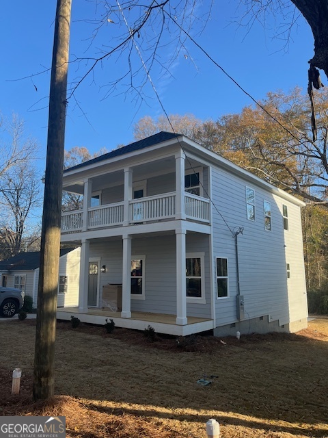 315 Ash Street Monroe, GA 30655 - Photo 16 of 17 a front view of a house with a yard