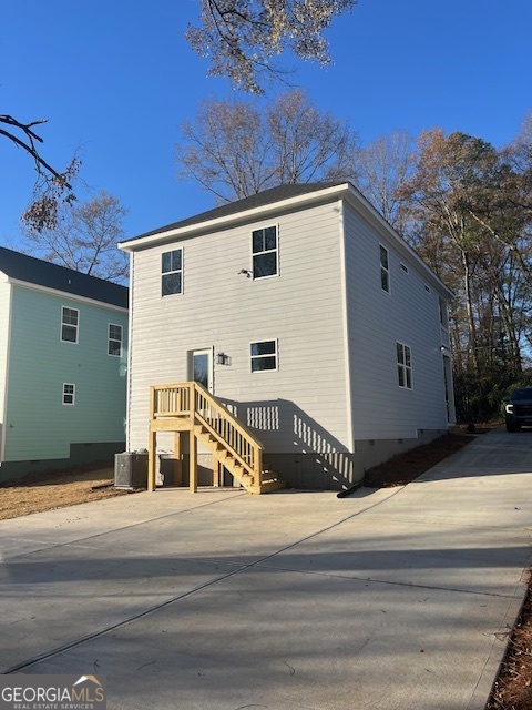 315 Ash Street Monroe, GA 30655 - Photo 17 of 17 a view of a house with a yard