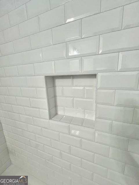 315 Ash Street Monroe, GA 30655 - Photo 18 of 21 a bathroom with a shower