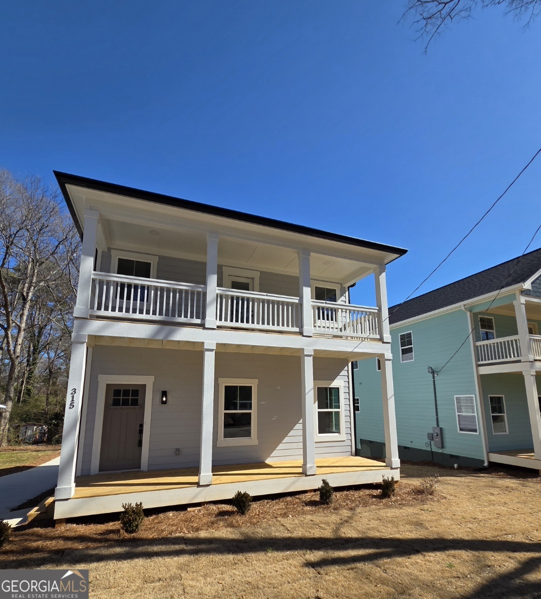 315 Ash Street Monroe, GA 30655 - Photo 2 of 21 a front view of a house