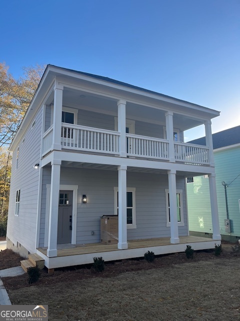 315 Ash Street Monroe, GA 30655 - Photo 2 of 17 a view of a house with a yard