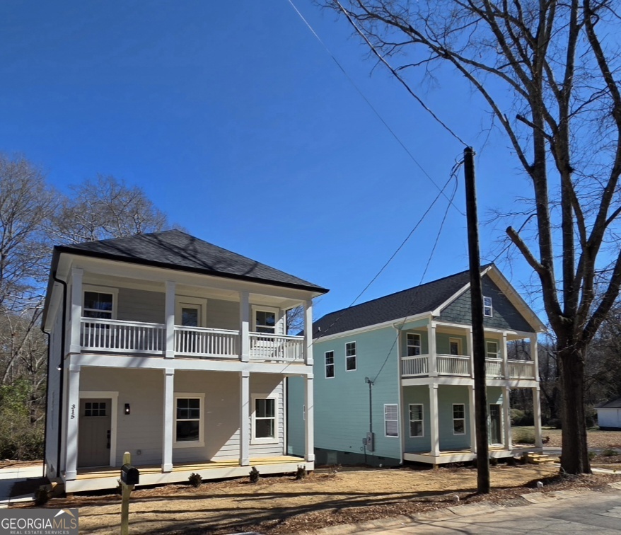 315 Ash Street Monroe, GA 30655 - Photo 3 of 21 a front view of a house with a porch