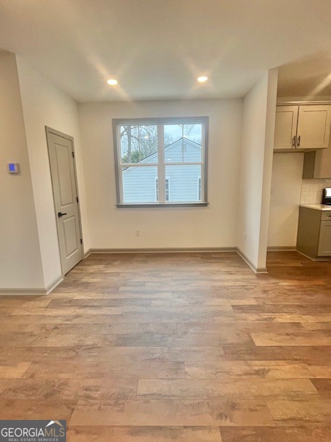 315 Ash Street Monroe, GA 30655 - Photo 8 of 21 a view of an empty room with a window