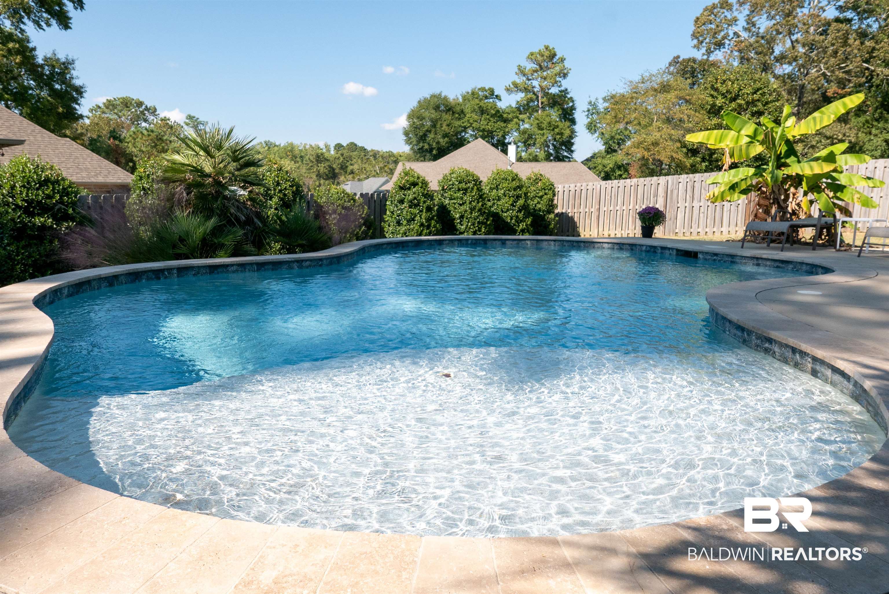 6684 Garrison Drive Daphne, AL 36527 - Photo 23 of 35 View of swimming pool with a patio area