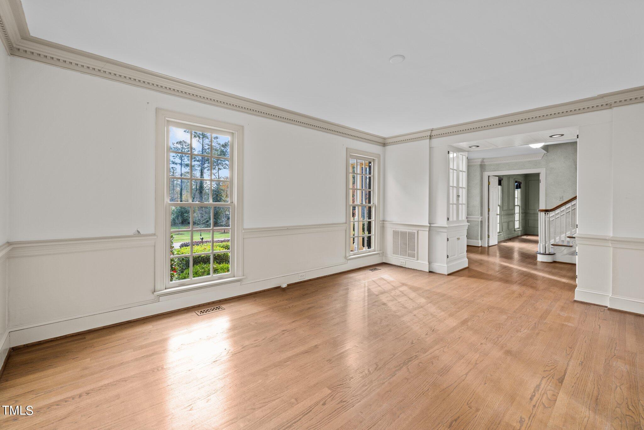 3608 Dover Road Durham, NC 27707 - Photo 15 of 58 an empty room with windows and entrance
