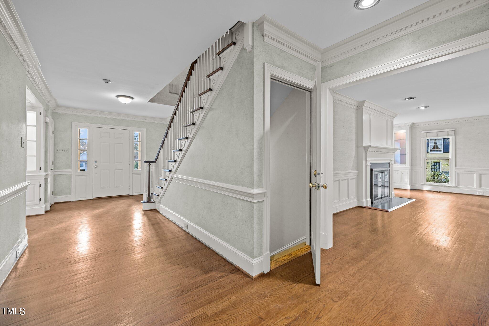 3608 Dover Road Durham, NC 27707 - Photo 24 of 58 a view of an entryway with wooden floor and windows