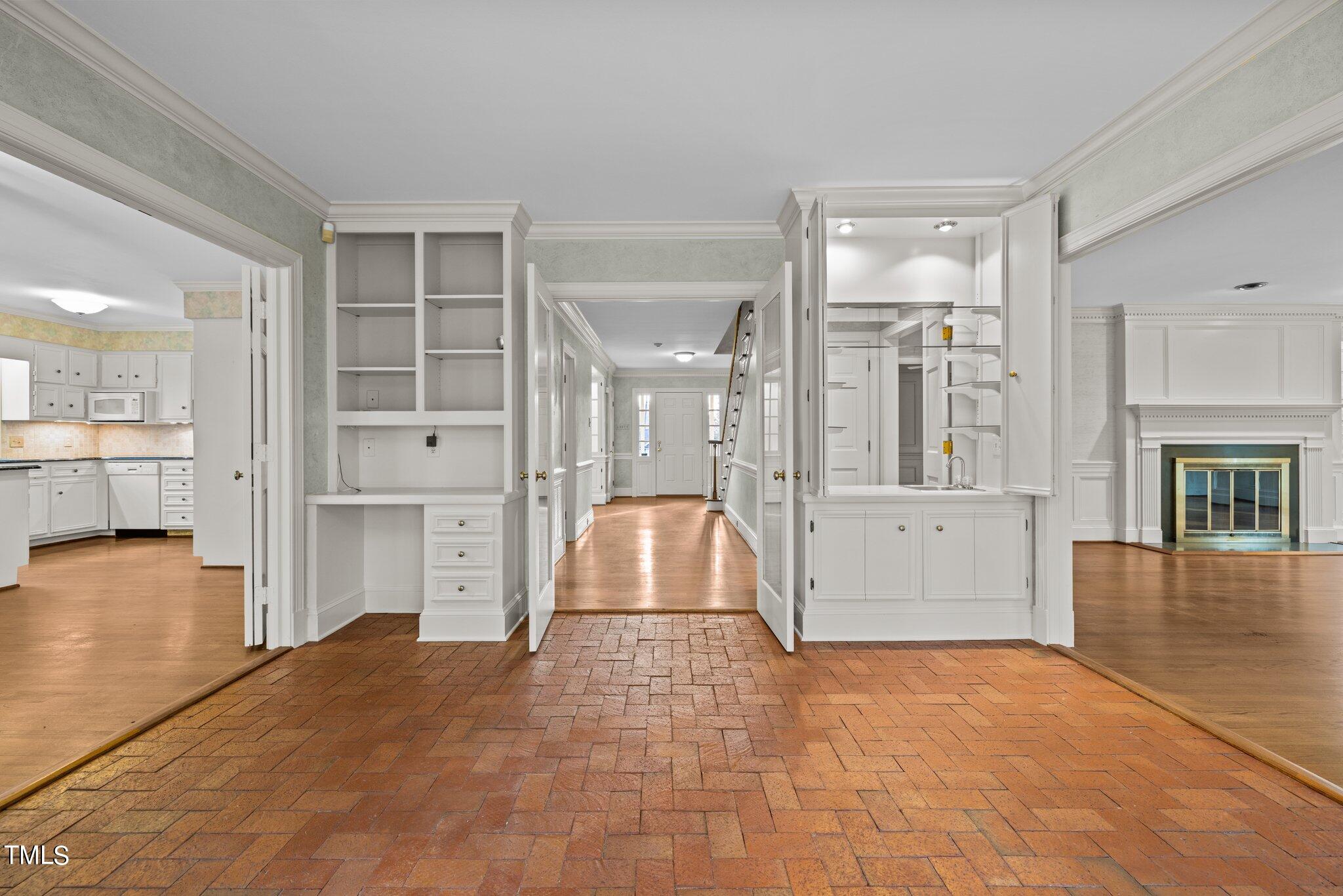 3608 Dover Road Durham, NC 27707 - Photo 27 of 58 a view of a kitchen with furniture and wooden floor