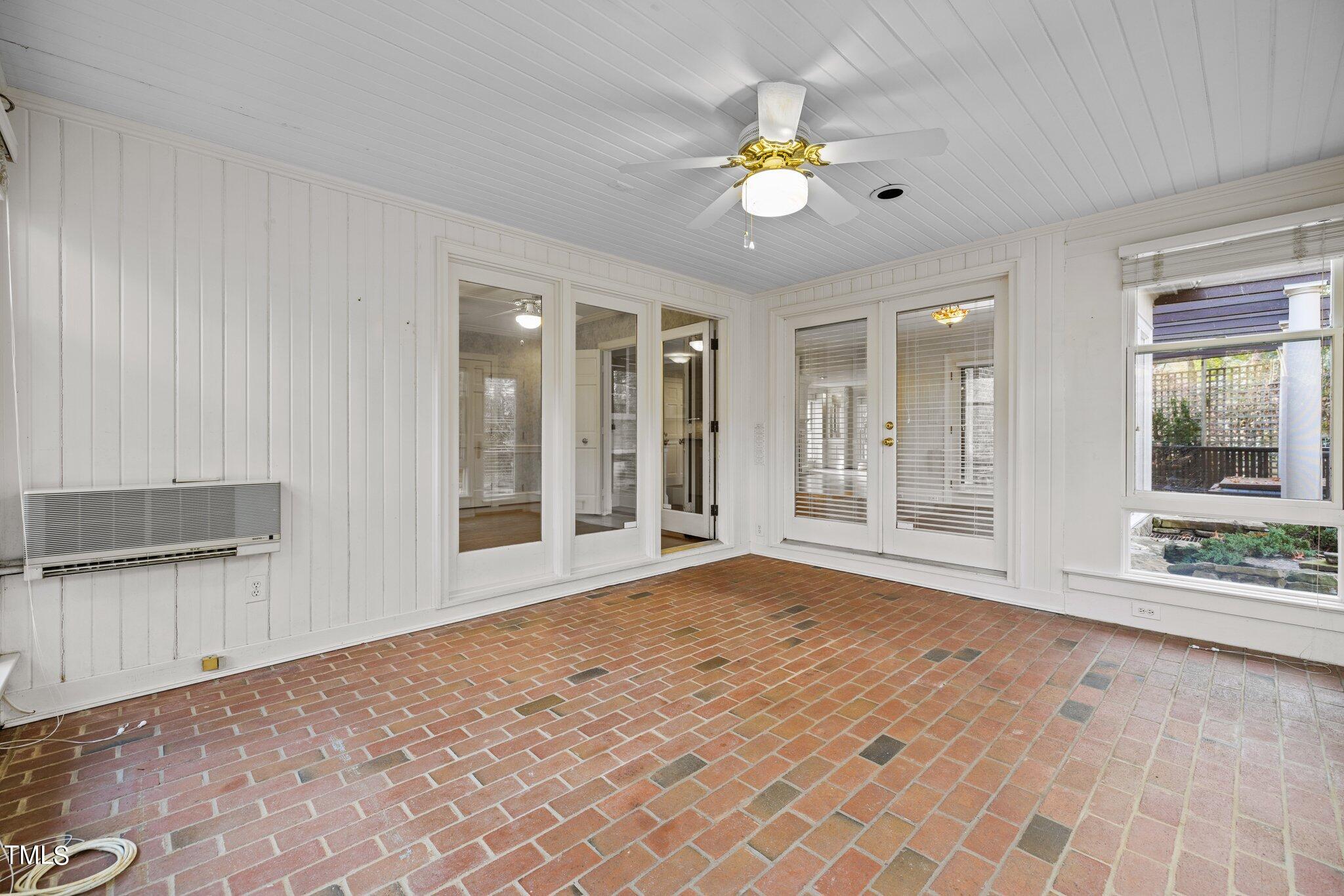 3608 Dover Road Durham, NC 27707 - Photo 30 of 58 a view of an empty room with window and cabinet
