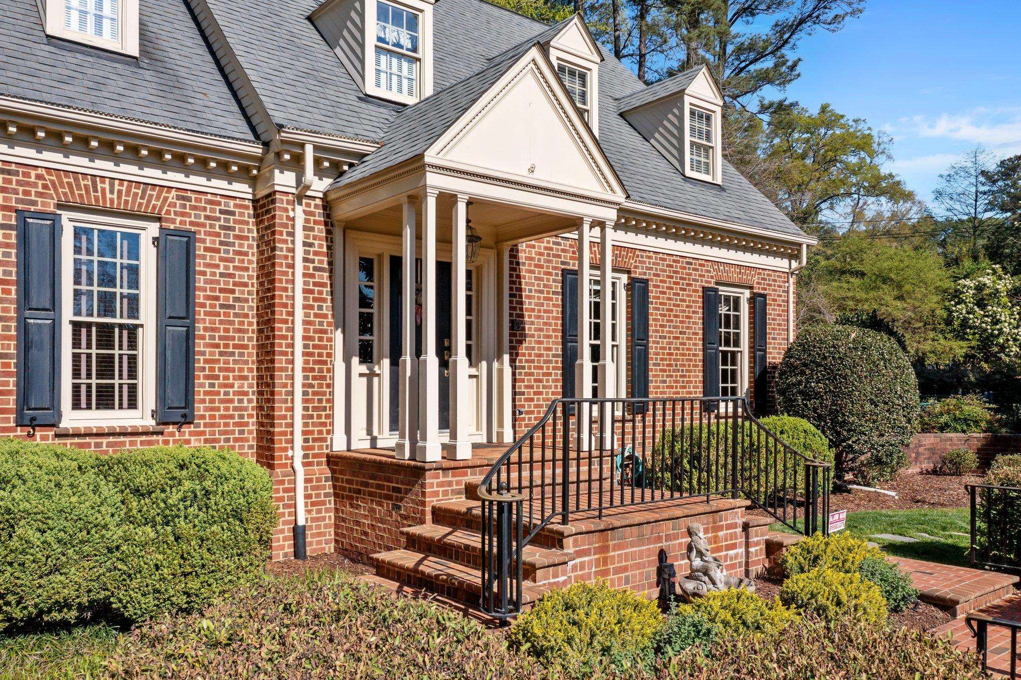 3608 Dover Road Durham, NC 27707 - Photo 3 of 58 front view of a house with a small yard