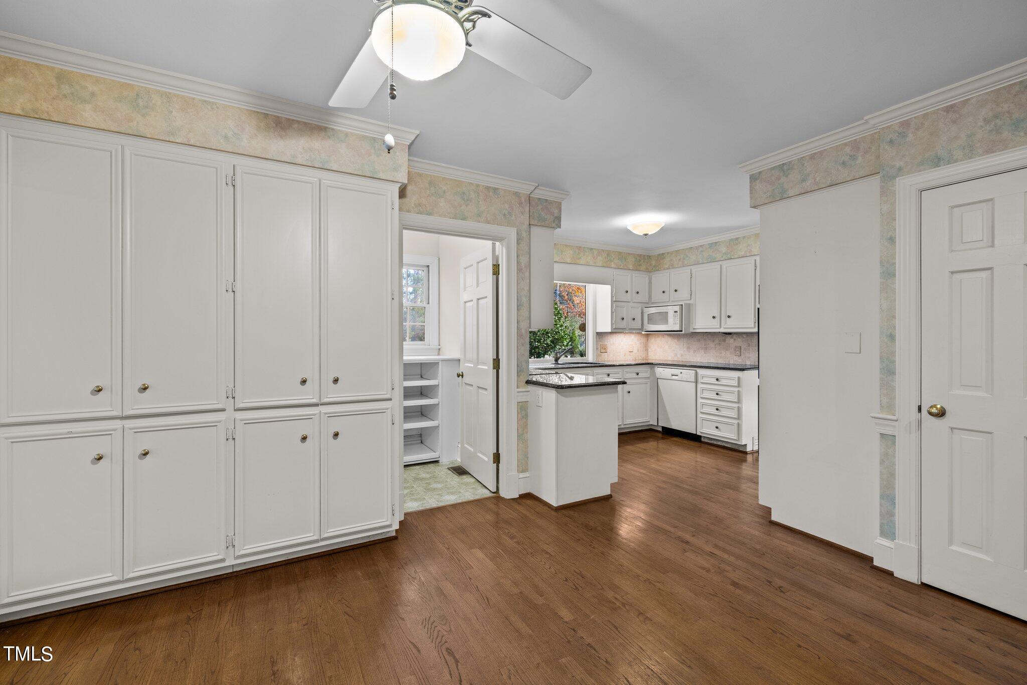 3608 Dover Road Durham, NC 27707 - Photo 31 of 58 a view of a kitchen with wooden floor