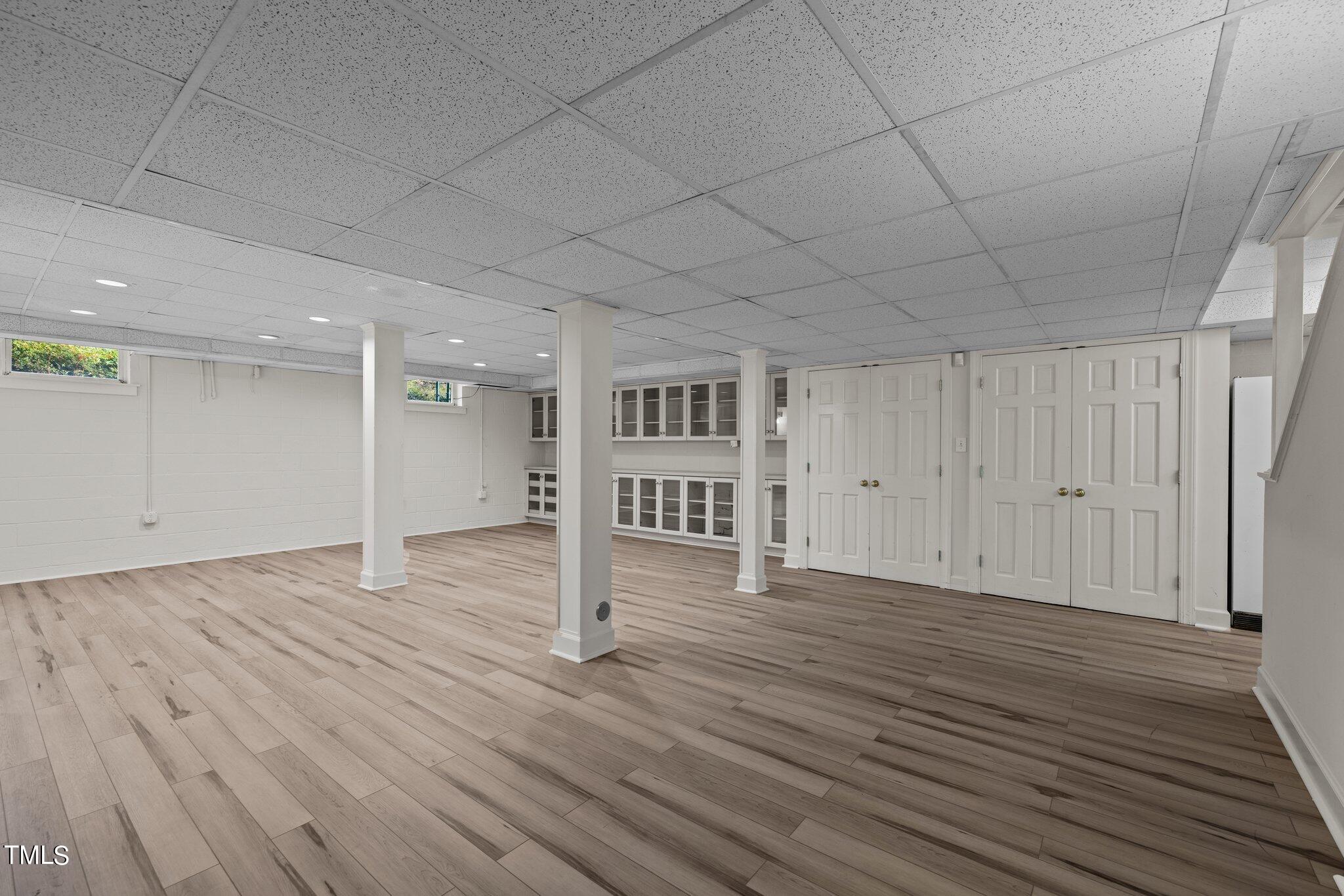 3608 Dover Road Durham, NC 27707 - Photo 51 of 58 a view of empty room with wooden floor