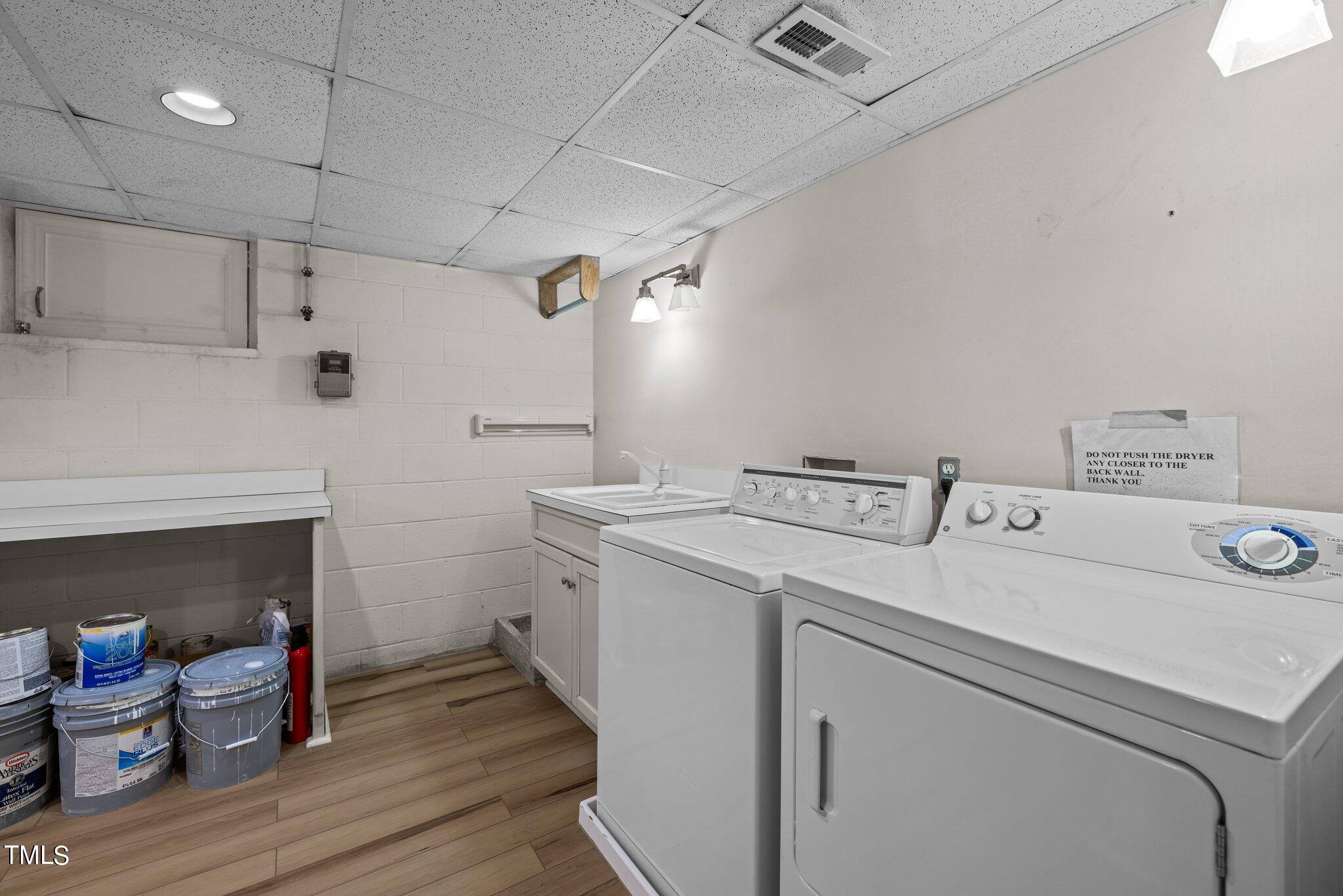 3608 Dover Road Durham, NC 27707 - Photo 56 of 58 a utility room with dryer and washer