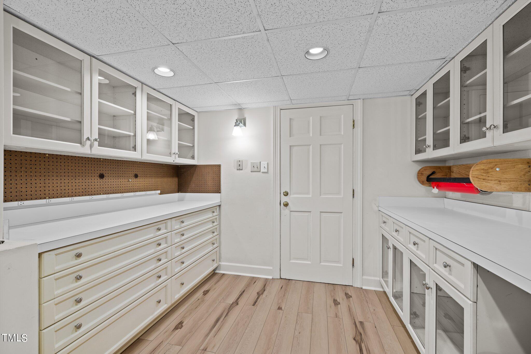 3608 Dover Road Durham, NC 27707 - Photo 57 of 58 a view of room with window and wooden floor