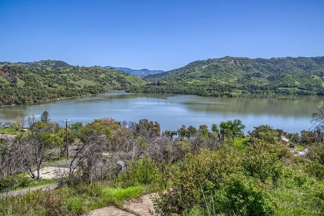 a view of a lake with a mountain in the background