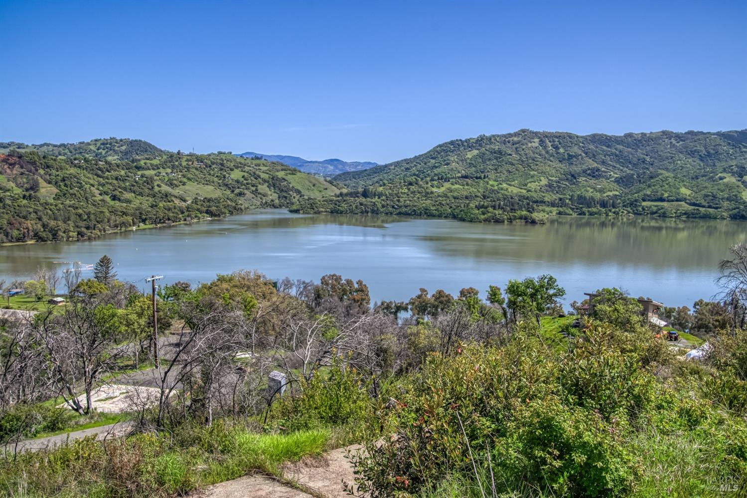 a view of a lake with a mountain in the background