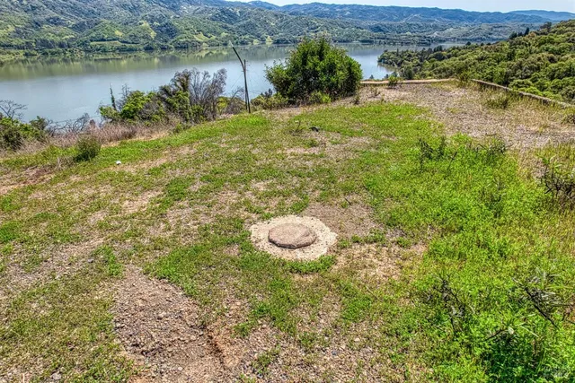a view of a lake with a mountain