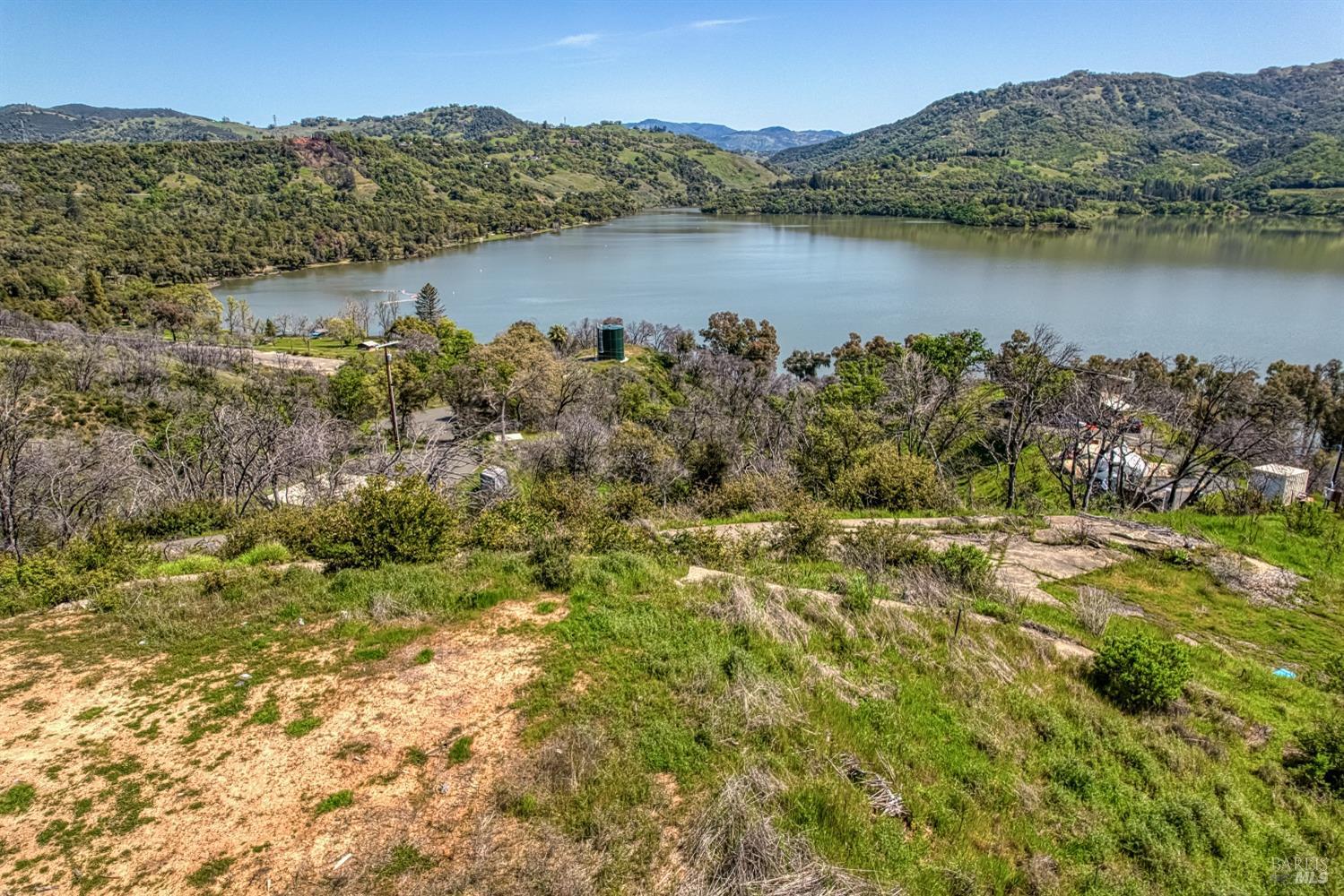 5851 Lake Ridge Road Ukiah, CA 95482 - Photo 13 of 17 a view of lake with mountain