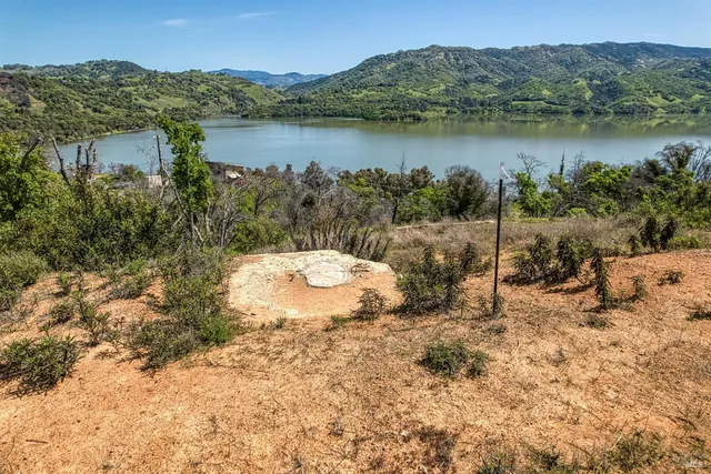 a view of a lake with a mountain in the background