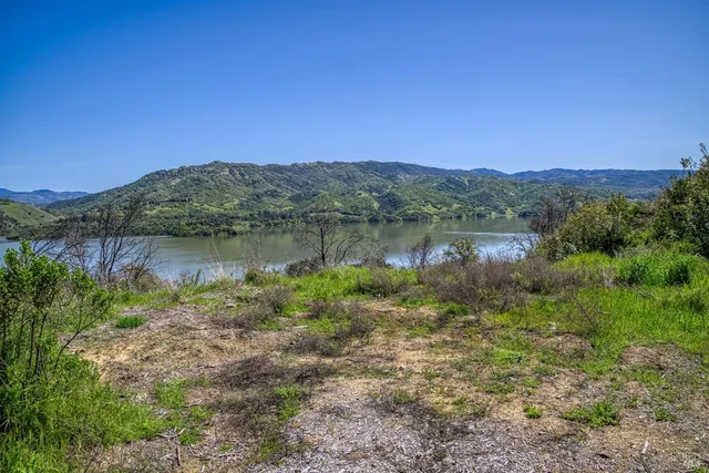 a view of a lake with a mountain in the background