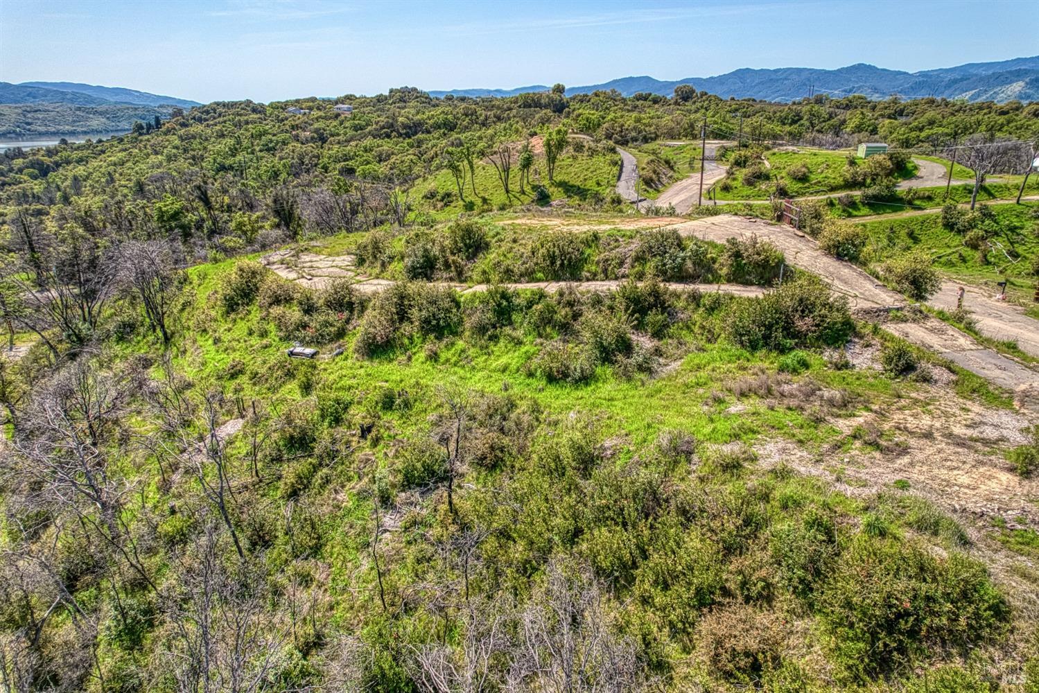 5851 Lake Ridge Road Ukiah, CA 95482 - Photo 6 of 17 a view of a city with green field