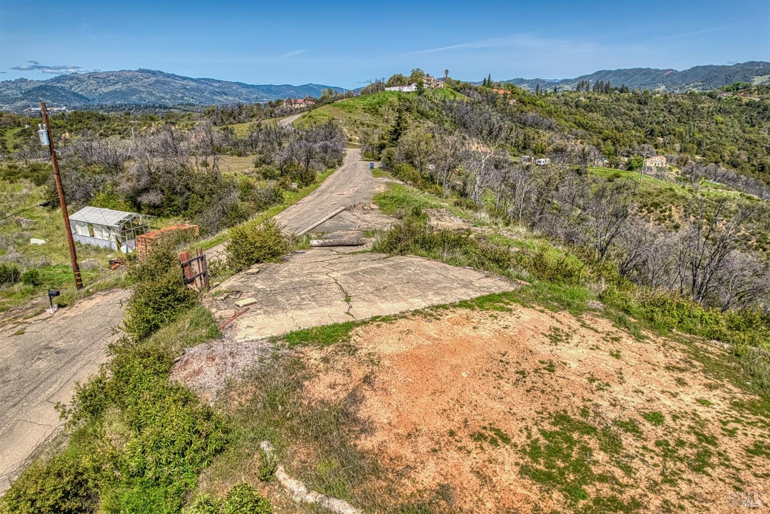 5851 Lake Ridge Road Ukiah, CA 95482 - Photo 9 of 17 a view of a city with mountains in the background