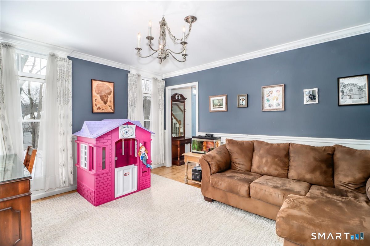 52 Key Rock Road Newtown, CT 06470 - Photo 17 of 40 a living room with furniture and couch