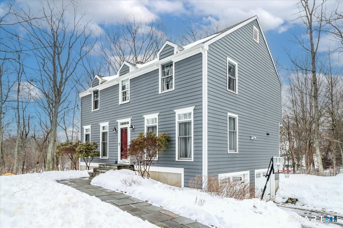52 Key Rock Road Newtown, CT 06470 - Photo 2 of 40 a view of a house with a patio