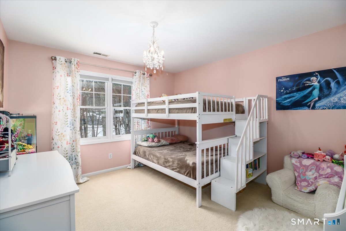 52 Key Rock Road Newtown, CT 06470 - Photo 25 of 40 a bedroom with furniture and a window