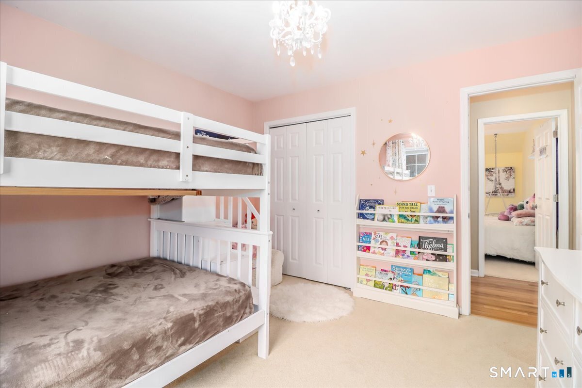 52 Key Rock Road Newtown, CT 06470 - Photo 26 of 40 a bedroom with a bed and a window